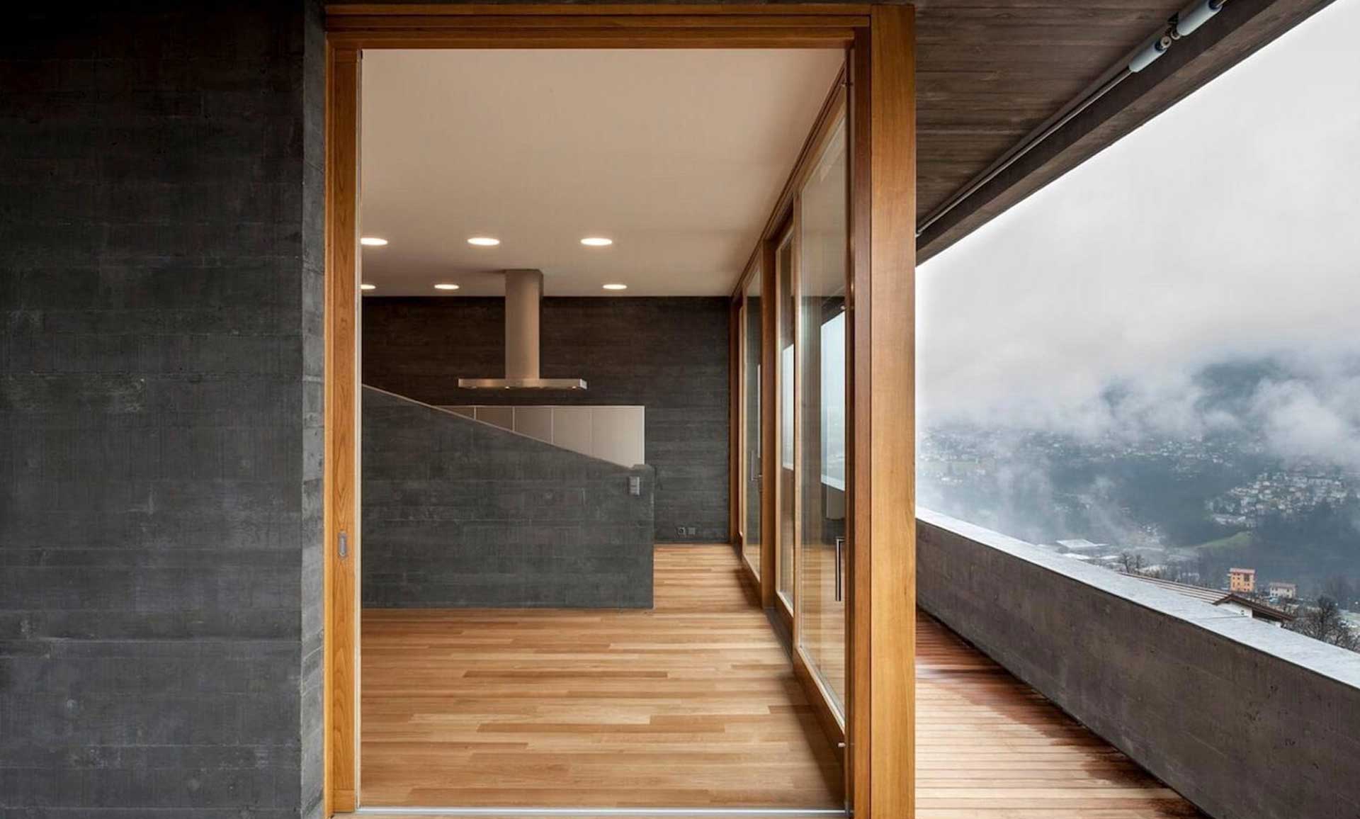 villa-comano-concrete-wood-house-mountian-view-window